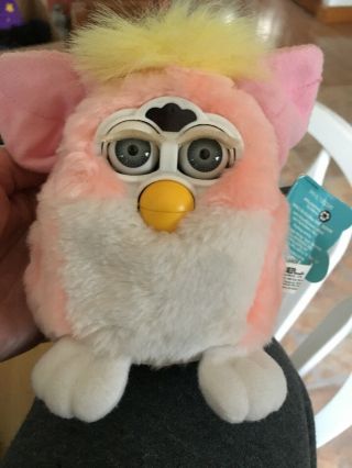 Furby Babies Pink White And Yellow With Blue Eyes Well.