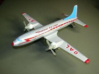 Mf - 104 Overseas Airlines Passenger Plane Friction Tin Toy Airplane