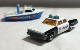 MATCHBOX 52 POLICE LAUNCH BOAT,  10 PLYMOUTH POLICE CAR,  MAJORETTE HELICOPTER 2