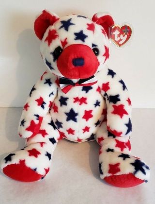 Ty Beanie Baby,  Buddy " Red " The White Bear With Red And Blue Stars.