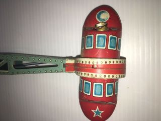 TIN TOY TWIRLY WHIRLY ROCKET RIDE ALPS JAPAN ARM PART 3