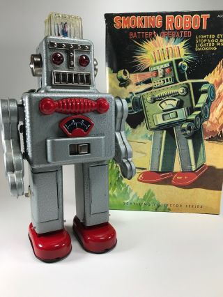 Schylling Collector Series Battery Operated Chrome Smoking Spaceman Tin Robot
