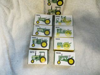 Ertl Eight (8) 593 John Deere Miniature Farm Tractors 1:64 Complete Set