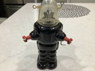 1950s Cragstan Japan Robby Robot Space Trooper,  Black,  6 - 1/2” Wind Up
