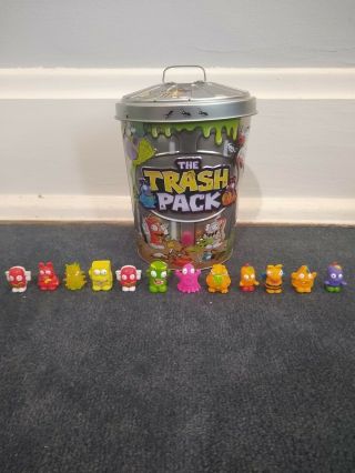 Collectable Trash Pack Tin Garbage Can And 12 Toy Figures.