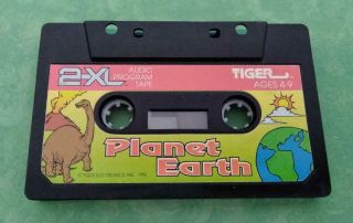 Tiger Electronic 2 - Xl Talking Robot Cassette Tape Planet Earth