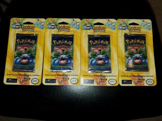 Four 1999 Pokémon base set booster pack Unlimited blister Venusaur 2