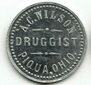 Piqua Oh Token - A.  C.  Wilson,  Druggist - 5¢ Glass Soda Water - Miami County Ohio
