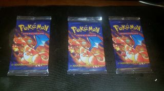 (3) 1999 Pokemon Base Set Booster Pack " Charizard Art " Unweighed