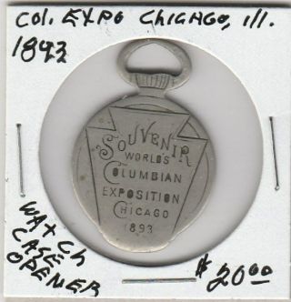 (h) Token - Columbia Exposition - Chicago,  Il - 1893 - Watch Case Opener