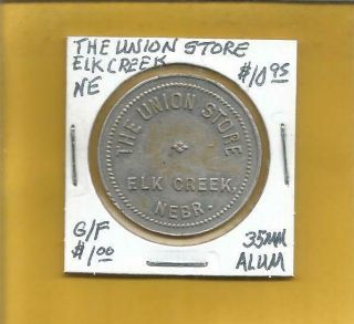 The Union Store Elk Creek Nebraska Token G/f $1.  00 Alum 35 Mm