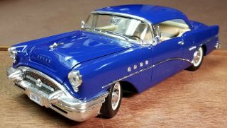 Buick Century.  1955.  Hardtop.  1/18 Scale.  Blue.  Diecast.  Mira.