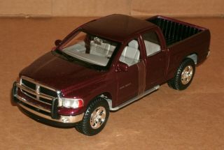 1/27 Scale 2002 Dodge Ram Quad Cab 1500 Diecast Model Truck - Maisto 31963 Red