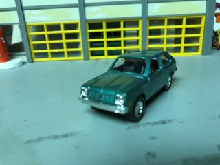 1/64 1978 Chevy Chevette/Met.  Green/Blk Int/4cyl.  Auto/Rubber Tires/Stock Hubcap 2