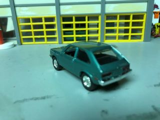 1/64 1978 Chevy Chevette/Met.  Green/Blk Int/4cyl.  Auto/Rubber Tires/Stock Hubcap 3