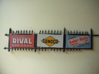 VINTAGE FENCE OF METAL SIGNS,  SUNOCO,  BABY RUTH,  RIVAL DOG FOOD 2