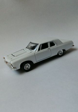 1963 Plymouth Belvedere White Hot Wheels 100 1/64 Real Riders 3