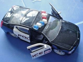 Jada Toys Diecast 1:32 Scale Police 2006 Dodge Charger Bigtime Muscle