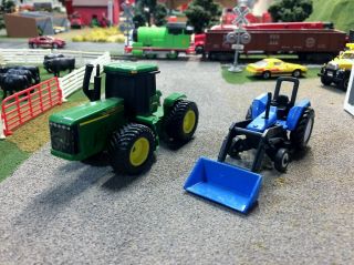 Ertl And Maisto 1:64 Diecast John Deere And Ford Holland Tractors