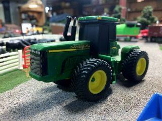 ERTL and Maisto 1:64 Diecast John Deere and Ford Holland Tractors 2