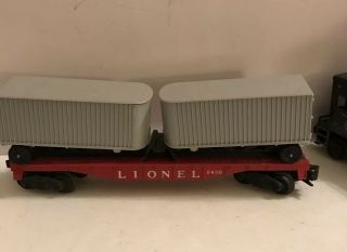 Postwar Lionel No.  6430 Flat Bed Carier With 2 Truck Trailers.