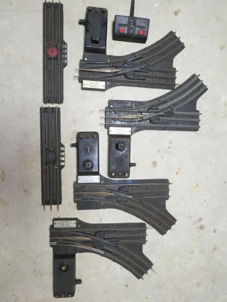 2 Lionel 022 O Gauge Remote Switches,  2 Ucs Tracks With 1 Controller